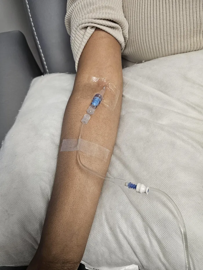 Client receiving IV hydration therapy at SerenIV & Wellness